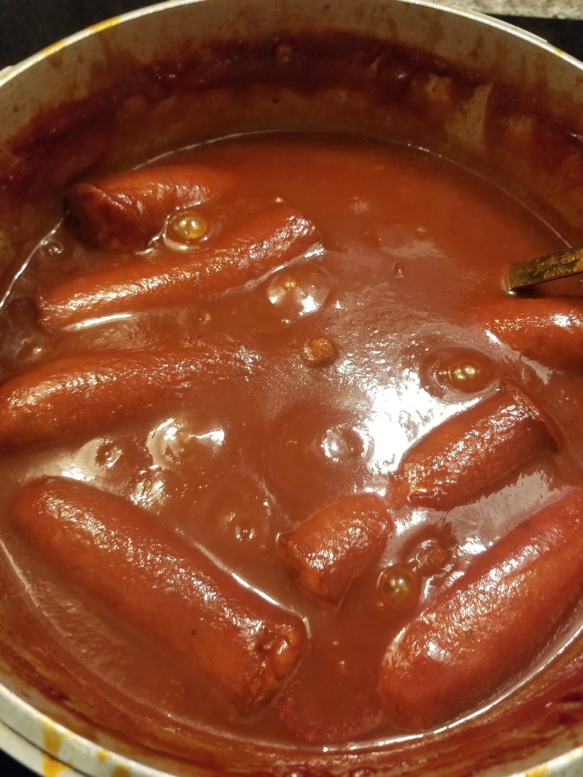 Rich glossy sausage ready for buns